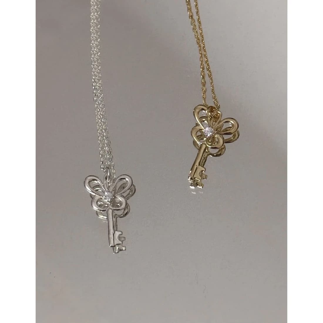 alloc house key necklace