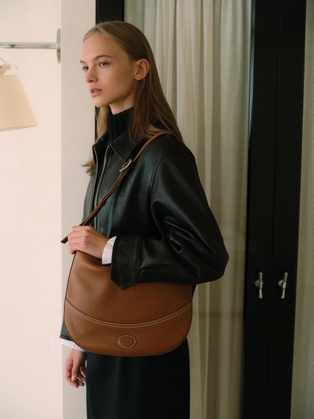 Soft leather half moon book bag Camel