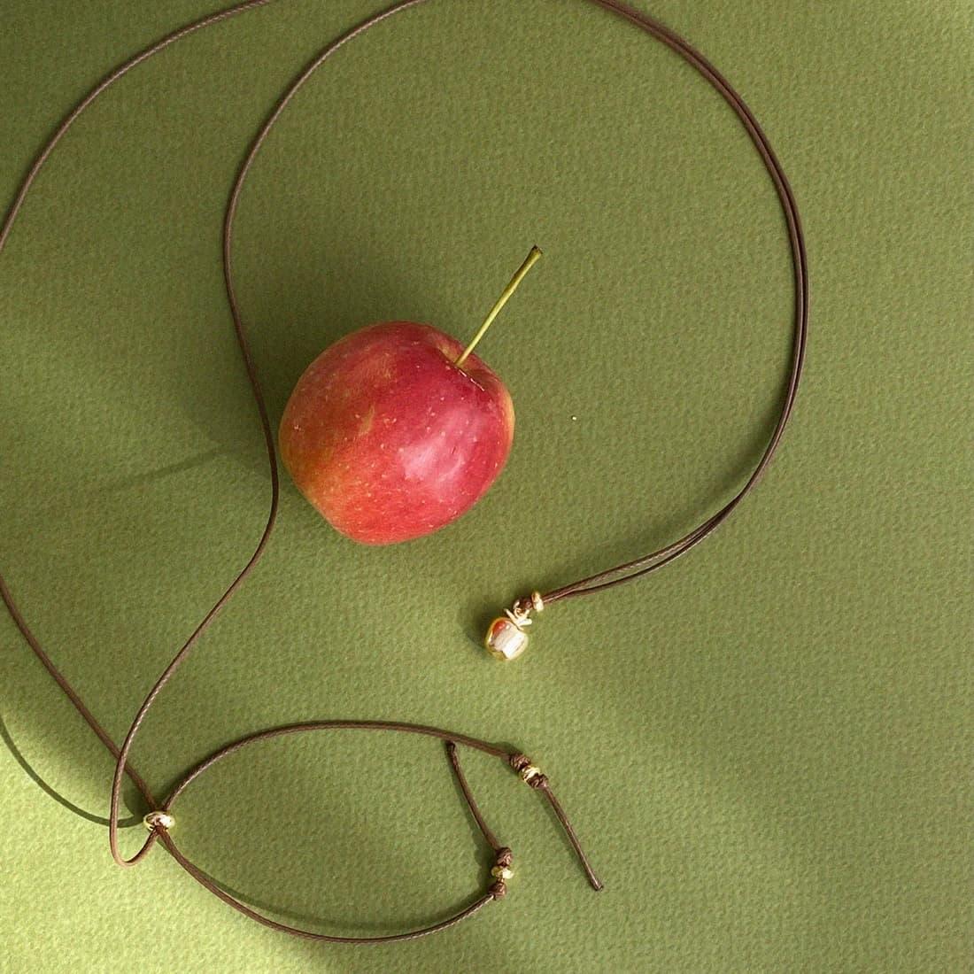 petit apple necklace