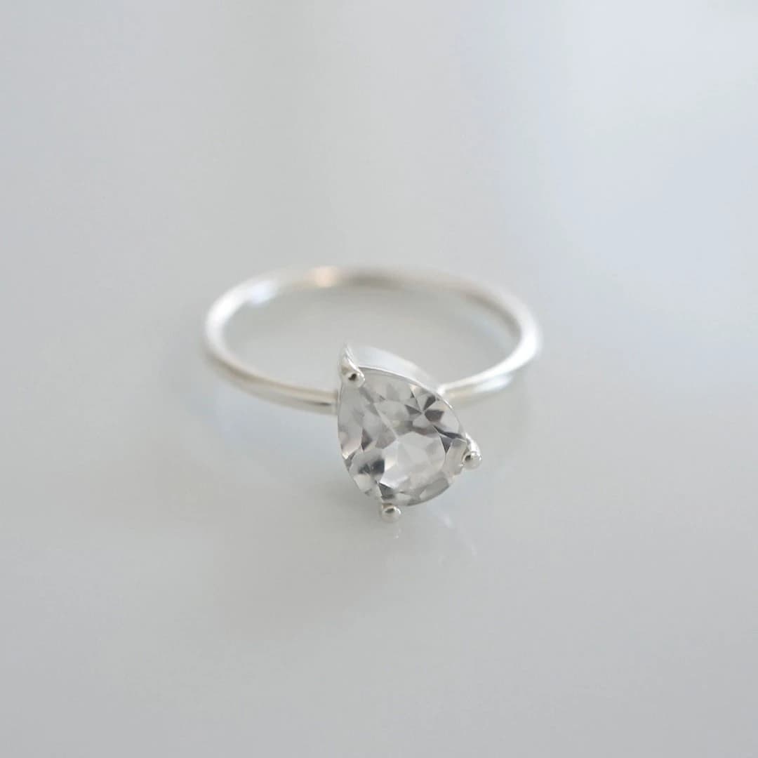 Tilt Topaz Ring