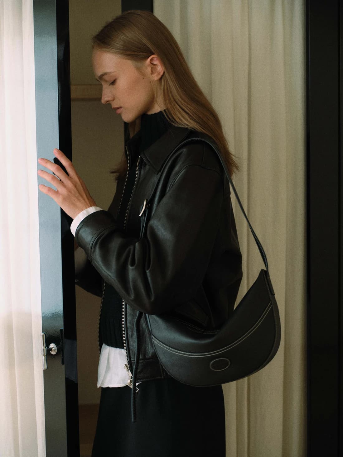 Soft leather half moon cross bag Black