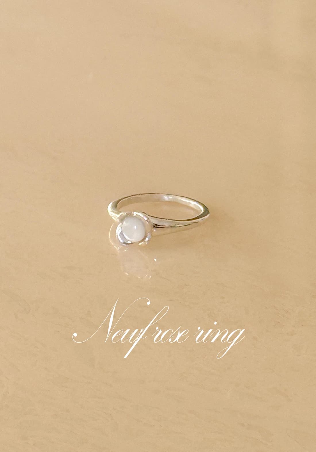 Neuf rose shell ring