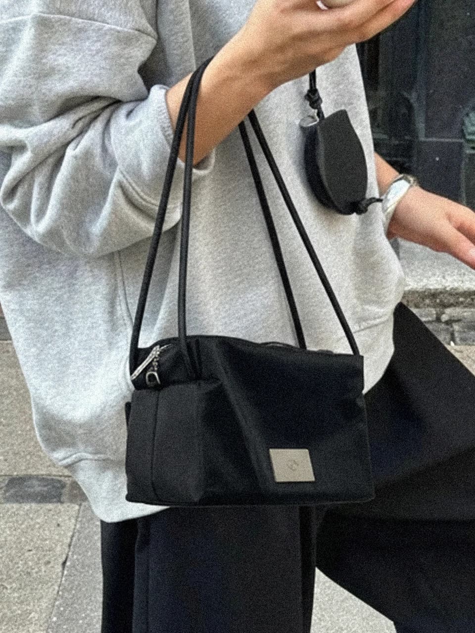 SYMBOL NYLON COMPACTBAG [BLACK]