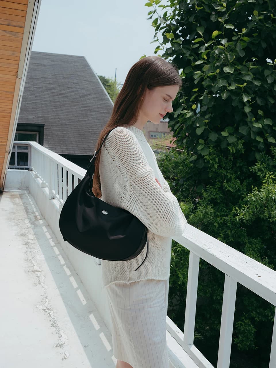 Classic button half moon nylon bag Black